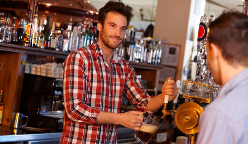 Capital People pulling pint