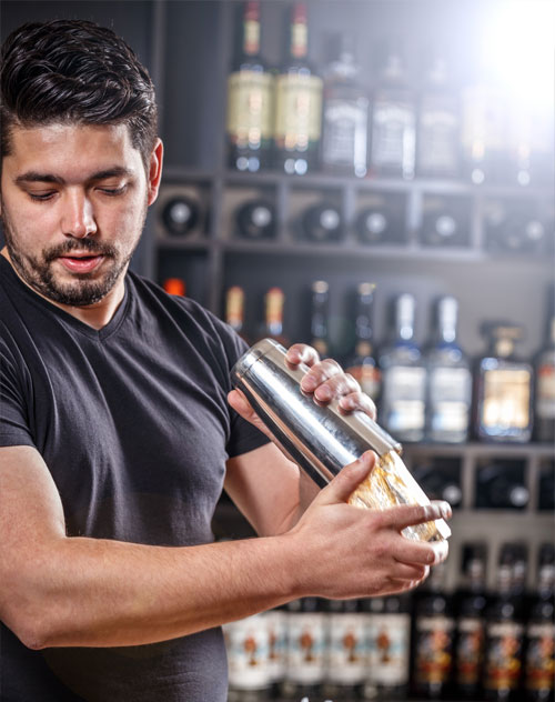 Capital People barman making cocktails